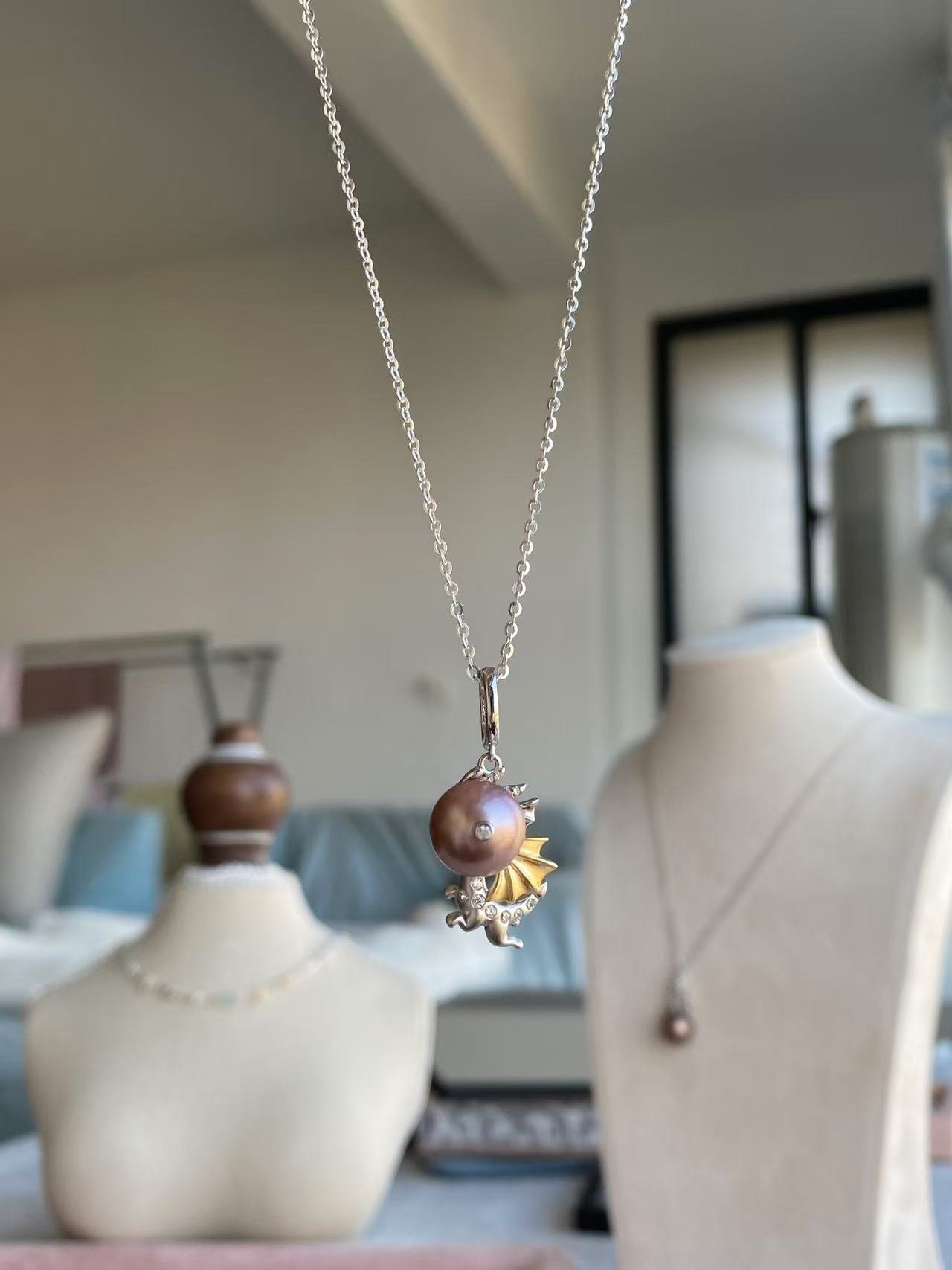 Small dragon pearl pendant