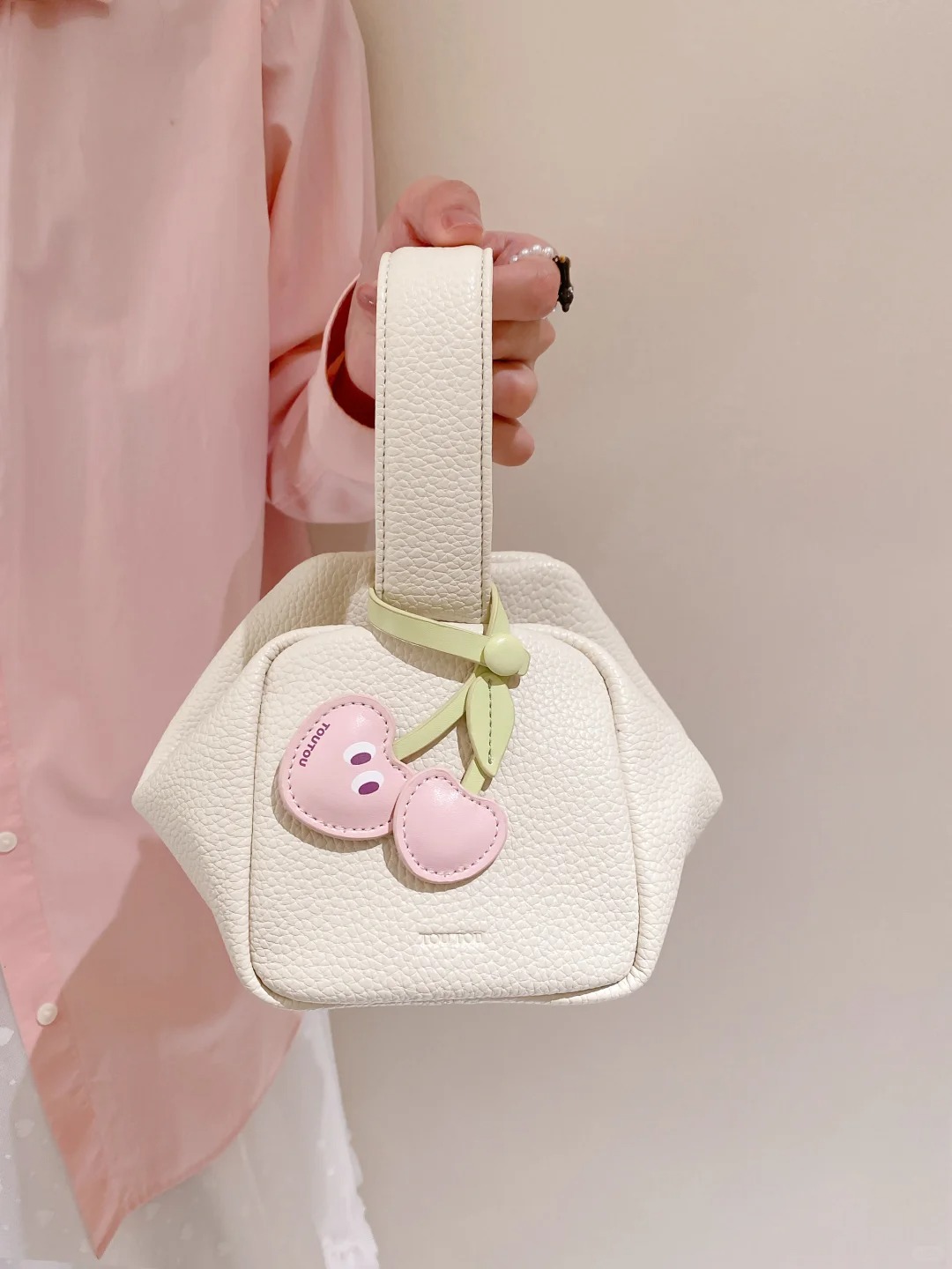 Milk white hand-held crossbody bag
